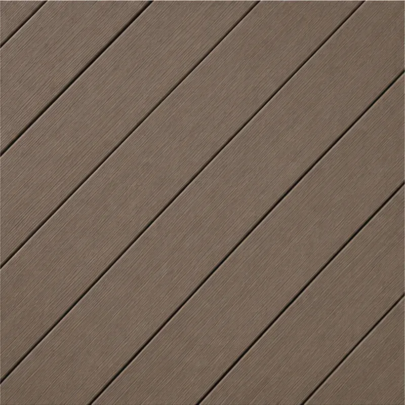 Close-up of taupe composite deck boards laid diagonally
